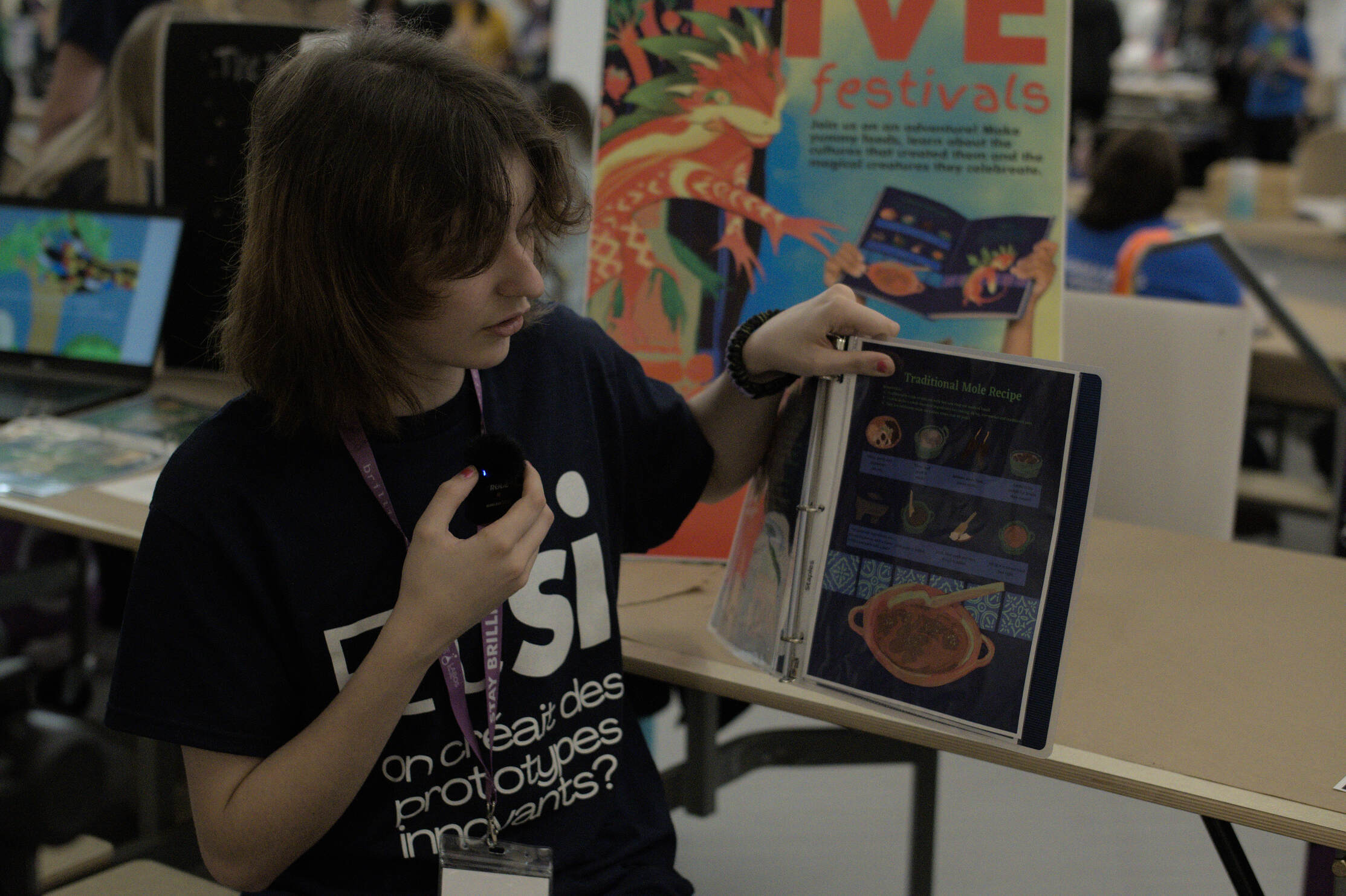 Kid presenting book